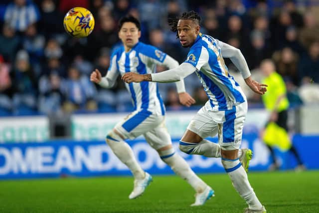 HAPPY: David Kasumu is enjoying Huddersfield Town's change of emphasis since the sacking of Darren Moore
