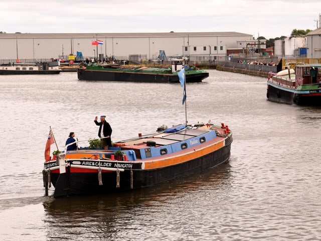 The barge Pauline joins fellow vessels as the flotilla circles the docks before returning along the Knottingley to Goole Canal