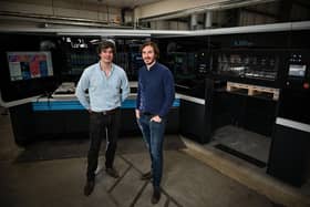 Instantprint founders James Kinsella (left) and Adam Carnell (right) pictured with instantprint’s  first Landa Press. Picture supplied by instantprint