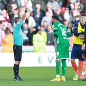 SEEING RED: Referee David Webb dismisses Sheffield United's Wes Foderingham