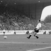West Germany's Franz Beckenbauer guides the ball past Switzerland goalkeeper Karl Elsener to score his team's fourth goal in their game at Hillsborough in the 1966 World Cup. Beckenbauer, who led West Germany to World Cup glory as both a captain and manager, has died at the age of 78. Photo: PA Photos/PA Wire.