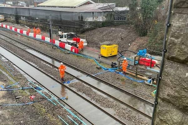 Network Rail staff pump flood water at Kirkstall on Tuesday