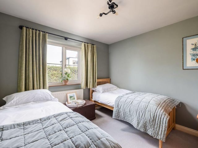 A third bedroom provides another comfortable double room, also with a front-facing window.