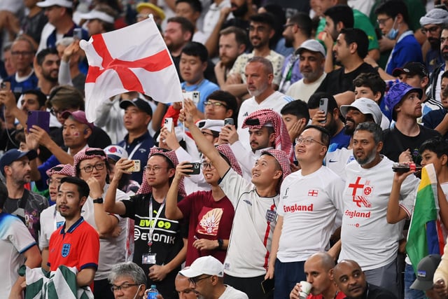 AL KHOR, QATAR - DECEMBER 04: England fans show their support during the FIFA World Cup Qatar 2022 Round of 16 match between England and Senegal at Al Bayt Stadium.