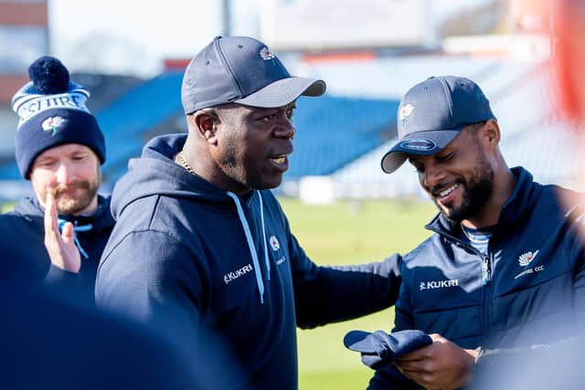 Ottis Gibson, the Yorkshire head coach, presents new signing Shai Hope with his cap ahead of the match against Leicestershire. Picture by Allan McKenzie/SWpix.com