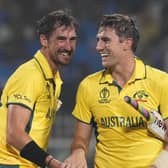 FINAL RECKONING: Mitchell Starc (left) and Australia's captain Pat Cummins celebrate their win over South Africa in the Thursday's semi-final in Kolkata. Picture: Photo/Bikas Das.