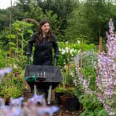 Kendall Turner of Bloom Sheffield amongst the flowers in her allotment