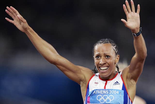 Britain's Kelly Holmes reacts after winning the bronze in the women's 1,500m final at the Olympic Stadium (Picture: JEFF HAYNES/AFP via Getty Images)