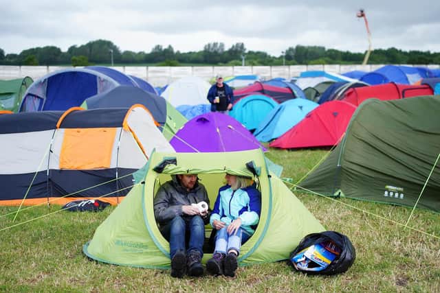Festival-goers in a tent. Picture: Ben Birchall/PA.
