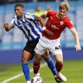 Barnsley's Luca Connell (right) competes with Sheffield Wednesday rival Liam Palmer (left) in their fixture at Hillsborough in September. Picture: Steve Ellis.
