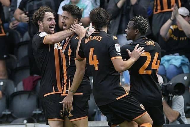 Fit-again Hull City midfielder Ozan Tufan, pictured celebrating after scoring against Sheffield Wednesday in August - when he netted a hat-trick. The Turkish international is available for Saturday's Championship home game with Southampton. Picture: Steve Ellis.