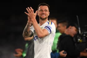 GOODBYE? Leeds United captain Liam Cooper applauds supporters after the 4-0 win at home to Norwich City