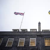 The Union flag and the flag of Ukraine fly above Downing Street following the announcement of a major new package of £2.5bn in military aid to Ukraine over the coming year. PIC: Yui Mok/PA Wire