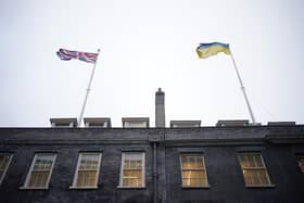 The Union flag and the flag of Ukraine fly above Downing Street following the announcement of a major new package of £2.5bn in military aid to Ukraine over the coming year. PIC: Yui Mok/PA Wire