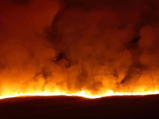 A wildfire on Saddleworth Moor in West Yorkshire in 2019. Firefighters who tackled the large moorland blaze said the fire was highly unusual for February and a product of days of dry weather. PIC: Joseph Bridgstock /PA Wire
