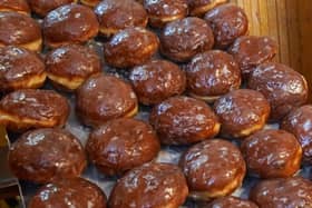 Jam-filled doughnuts 'Pączki' traditionally eaten on the last Thursday of Carnival. (Pic credit: Janek Skarzynski / Getty Images)