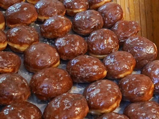 Jam-filled doughnuts 'Pączki' traditionally eaten on the last Thursday of Carnival. (Pic credit: Janek Skarzynski / Getty Images)