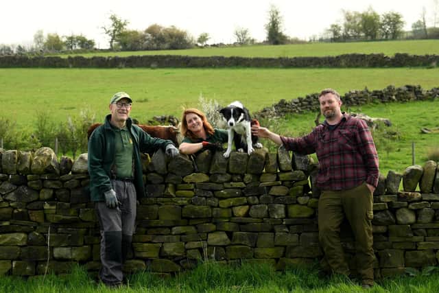 Graham Brown (left) and Megan Jeffery with her husband Jim with sheepdog Jake from the Yorkshire Drystone Walling Guild, Cropper Fold Farm, Eldwick,Bingley