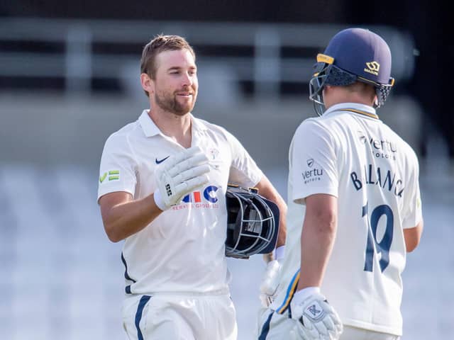 Old pals act: Dawid Malan, left, celebrates his century for Yorkshire against Sussex at Headingley in 2021 with team-mate Gary Ballance. Photo by Allan McKenzie/SWpix.com