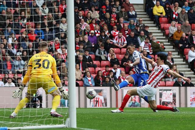 MAGIC MOMENT: Liam Palmer opens the scoring for Sheffield Wednesday