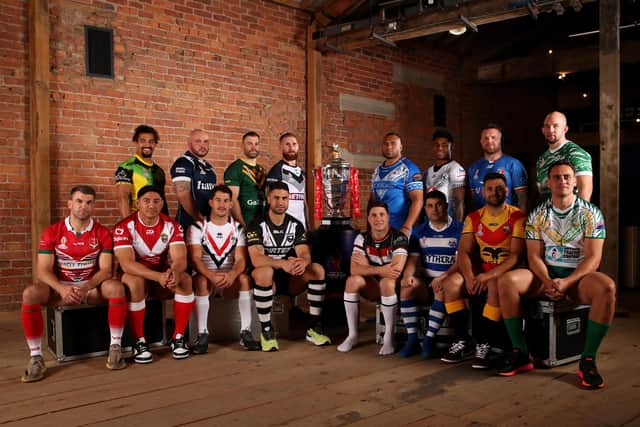 MANCHESTER, ENGLAND - OCTOBER 10: (Back Row L-R) Ashton Golding of Jamaica, Dale Ferguson of Scotland, James Tedesco of Australia, Sam Tomkins of England, Junior Paulo of Samoa, Kevin Naiqama of Fiji, Nathan Brown of Italy, George King of Ireland (Front Row L-R) Elliot Kear of Wales, Jason Taumalolo of Tonga, Benjamin Garcia of France, Jessa Bromwich of New Zealand, Mitchell Moses of Lebanon, Jordan Meads of Greece, Rhyse Martin of Papua New Guinea and Brad Takairangi of Cook Islands pose for a photograph during the Rugby League World Cup 2021 Tournament Launch events at the Science and Industry Museum on October 10, 2022 in Manchester, England. (Photo by Jan Kruger/Getty Images for RLWC2021)