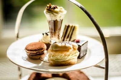 Dainty cakes and sandwiches can be enjoyed during afternoon tea. Image: Middlethorpe Hall
