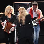 Christine McVie, Stevie Nicks and John McVie of Fleetwood Mac perform at the Person Of The Year gala. (Pic credit: Angela Weiss / AFP via Getty Images)