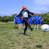 Snaith Juniors FC sporting their new Bellway sponsored kit as a Bellway sales advisor channels her inner Lioness