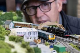 Richard Goddard with layout of fictional Rising Beck at the Model Railway Show held at Leeming Bar Station on the Wensleydale Railway, photographed by Tony Johnson for The Yorkshire Post.