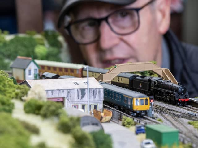 Richard Goddard with layout of fictional Rising Beck at the Model Railway Show held at Leeming Bar Station on the Wensleydale Railway, photographed by Tony Johnson for The Yorkshire Post.