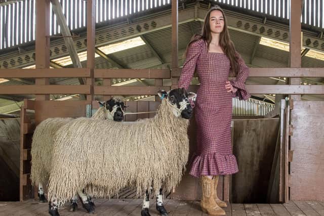 Maisie Townson wears a Mary Benson dress made in Abraham Moon tweed at the Great Yorkshire Showground Sheep Shearing Stage. Picture by Kate Mallender.