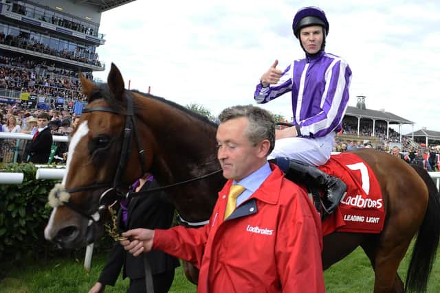 In the family: Joseph O'Brien riding Leading Light win The Ladbrokes St Leger at Doncaster racecourse on September 14, 2013 in Doncaster, England. (Picture: Alan Crowhurst/Getty Images)