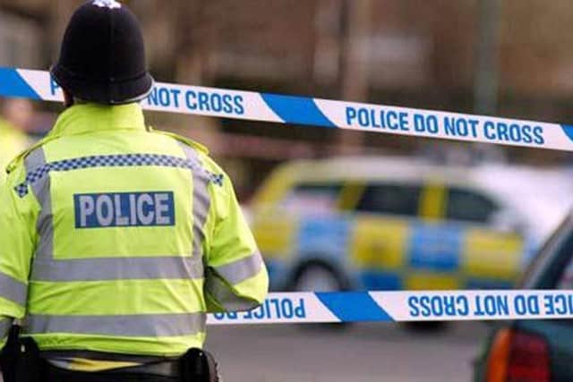 A man has been arrested and a murder inquiry launched following the stabbing