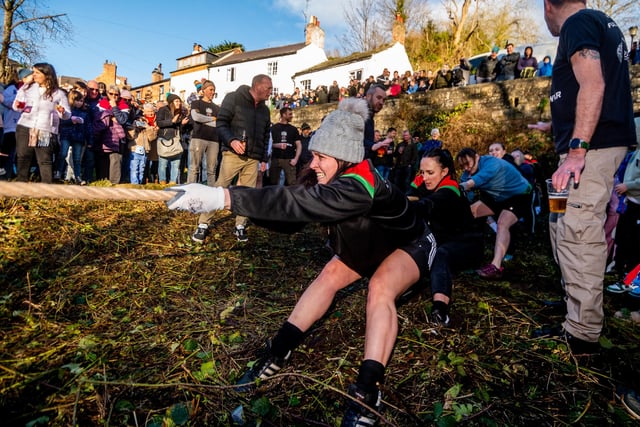 Return of the Boxing Day Knaresborough annual tug-of-war competition with both mens and ladies teams from the Half Moon Free House and Mother Shipton Inn competing in a tug-of-war contest across the River Nidd.