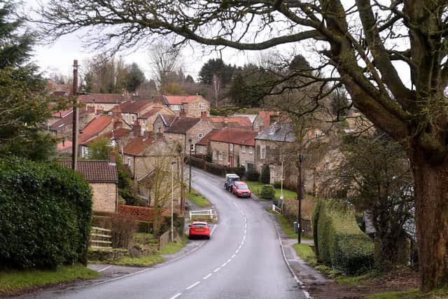 The main street through Ampleforth where the cottages are traditional