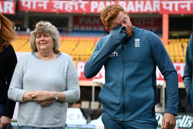 Jonny Bairstow, pictured in the England team huddle alongside his mother, Janet, wipes away a tear ahead of his 100th Test appearance. Photo by Gareth Copley/Getty Images.