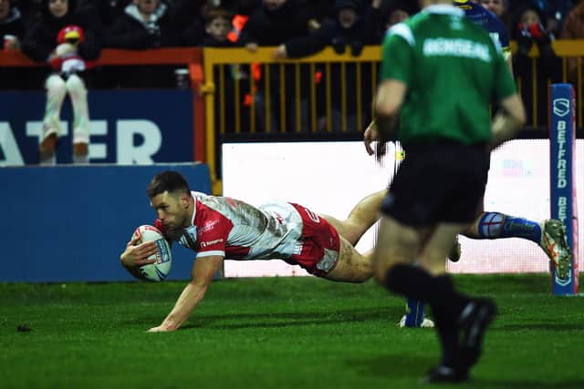 Tom Opacic slides over to score Hull KR's fourth try. (Photo: Jonathan Gawthorpe)