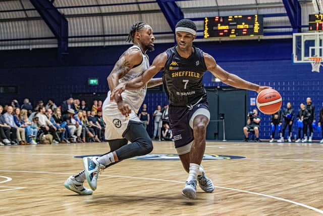 Sheffield Sharks' Kipper Nichols dribbles past Rickey McGill in the opener at Canon Medical Arena on 8th October 2023 (Picture: Tony Johnson)