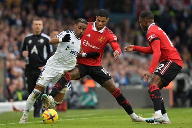 Difference maker: Marcus Rashford, centre, challenges Leeds United's Crysencio Summerville before scoring the goal that settled this fierce rivalry in favour of Manchester United. (Picture: Bruce Rollinson)