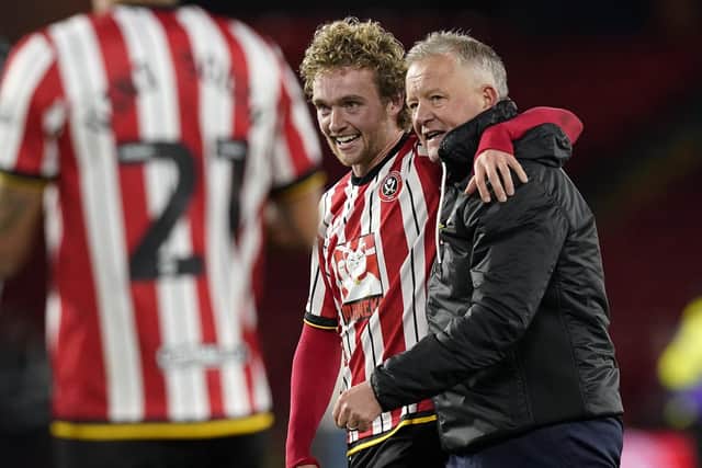 Sheffield, England, 29th November 2024. Tom Davies of Sheffield United celebrates with Chris Wilder manager of Sheffield United during the Sky Bet Championship match at Bramall Lane, Sheffield. Picture: Andrew Yates / Sportimage