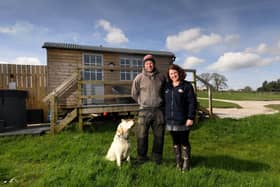 Richard and Louise Pullan pictured by one of the Shepherd Huts at  Breaks Fold Farm West End, Blubberhouses.