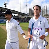 Stuart Broad, right, is handed a stump by James Anderson after the fifth Test against Australia at the Oval. Photo by Gareth Copley/Getty Images.