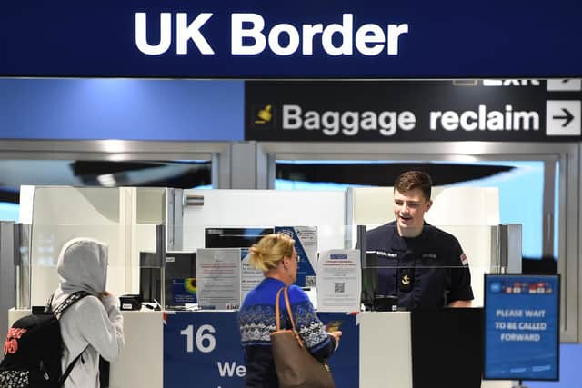 Passport control at Manchester Airport. PIC: Peter Powell/PA Wire