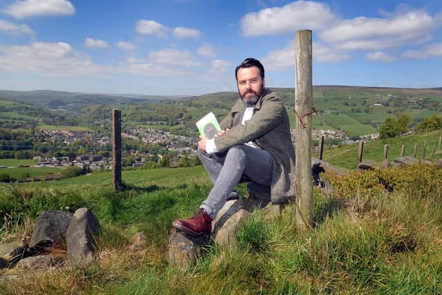 Author Benjamin Myers with his novel inspired by the Cragg Vale Coiners.
