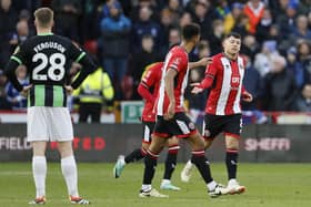 Sheffield United's Gustavo Hamer (right) celebrates scoring their side's first goal of the game during the Emirates FA Cup fourth round tie against Brighton at Bramall Lane. Picture: Richard Sellers/PA Wire.