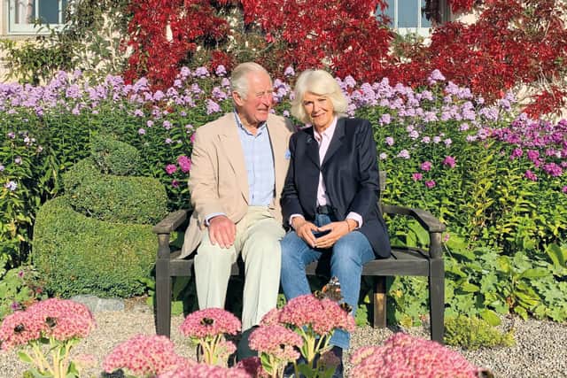 Charles and Camilla's photo was taken by a member of their staff at their Scottish home (Picture: Getty Images/Clarence House)