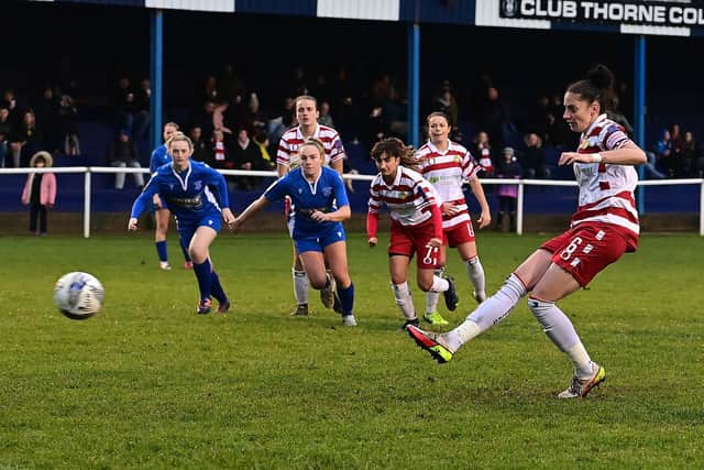 Doncaster Rovers Belles captain Jess Andrew scores from the penalty spot. (Picture courtesy of Howard Roe/AHPIX LTD)