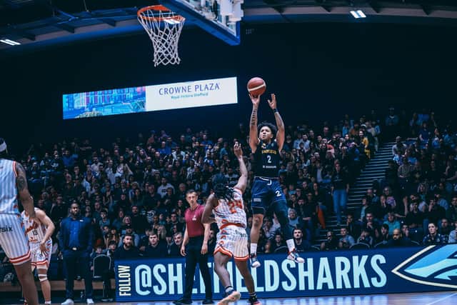 Prentiss Nixon takes a three-point shot against Leicester Riders at a packed Canon Medical Arena for game one. (Picture: Adam Bates)