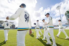 Shan Masood leads Yorkshire on to the field as the sun finally breaks on the new cricket season. Picture by Allan McKenzie/SWpix.com