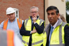 Rishi Sunak and Michael Gove during a visit to a housing development.